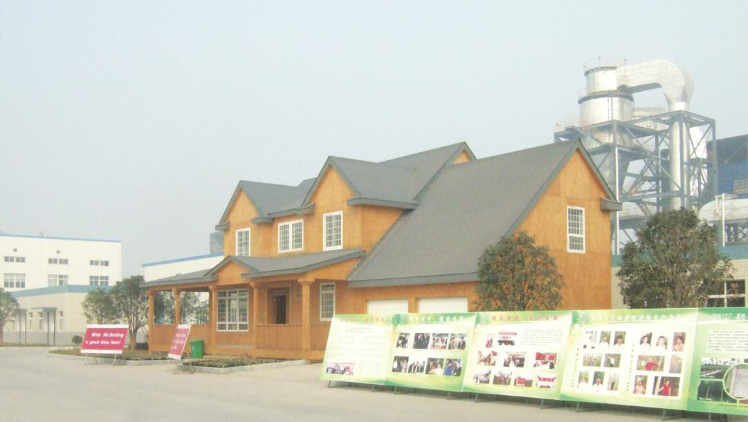 The three-bedroom house, built almost entirely of OSB, outside the Jingmen factory